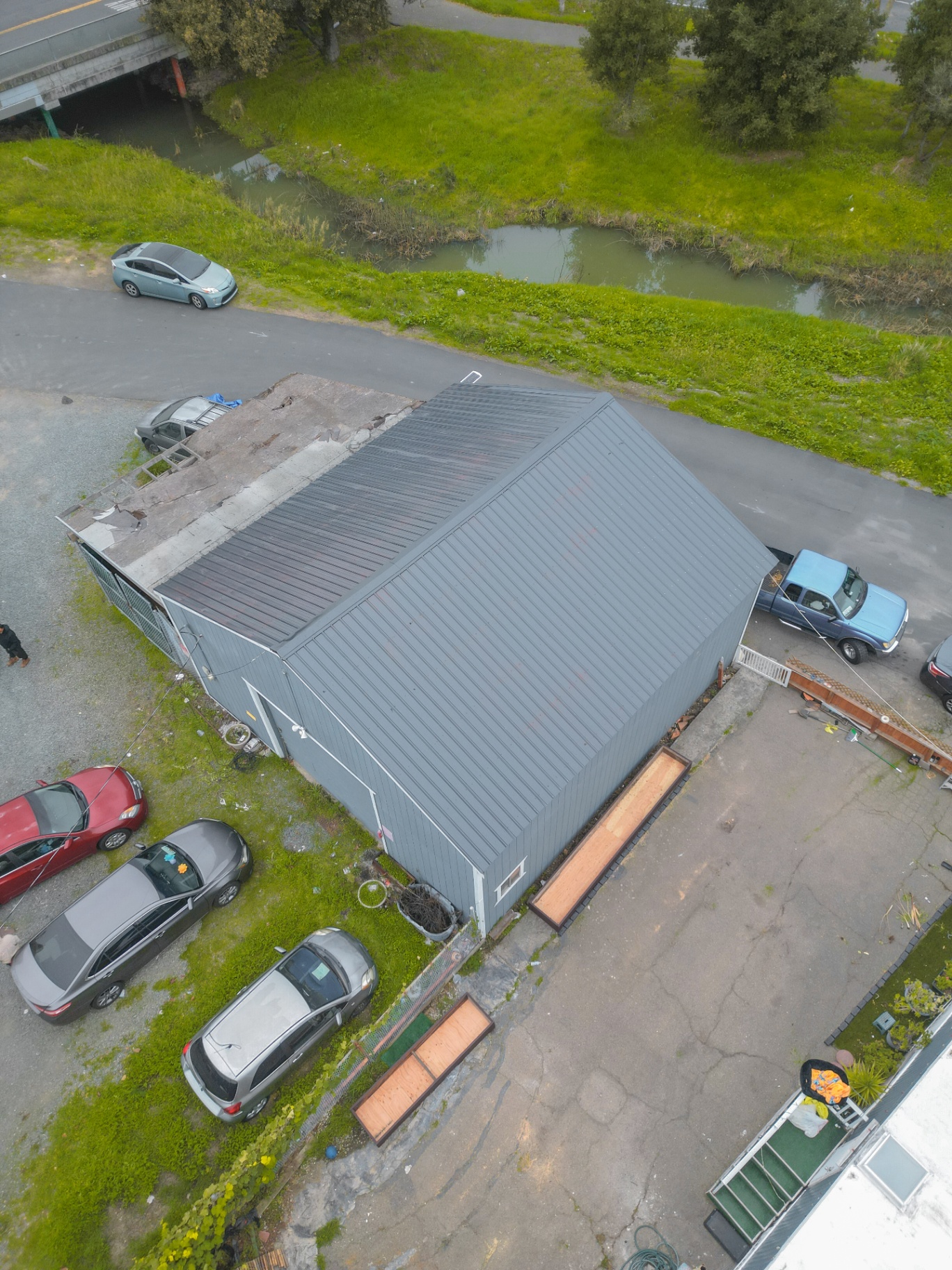 Rear aerial view of completed roof installation