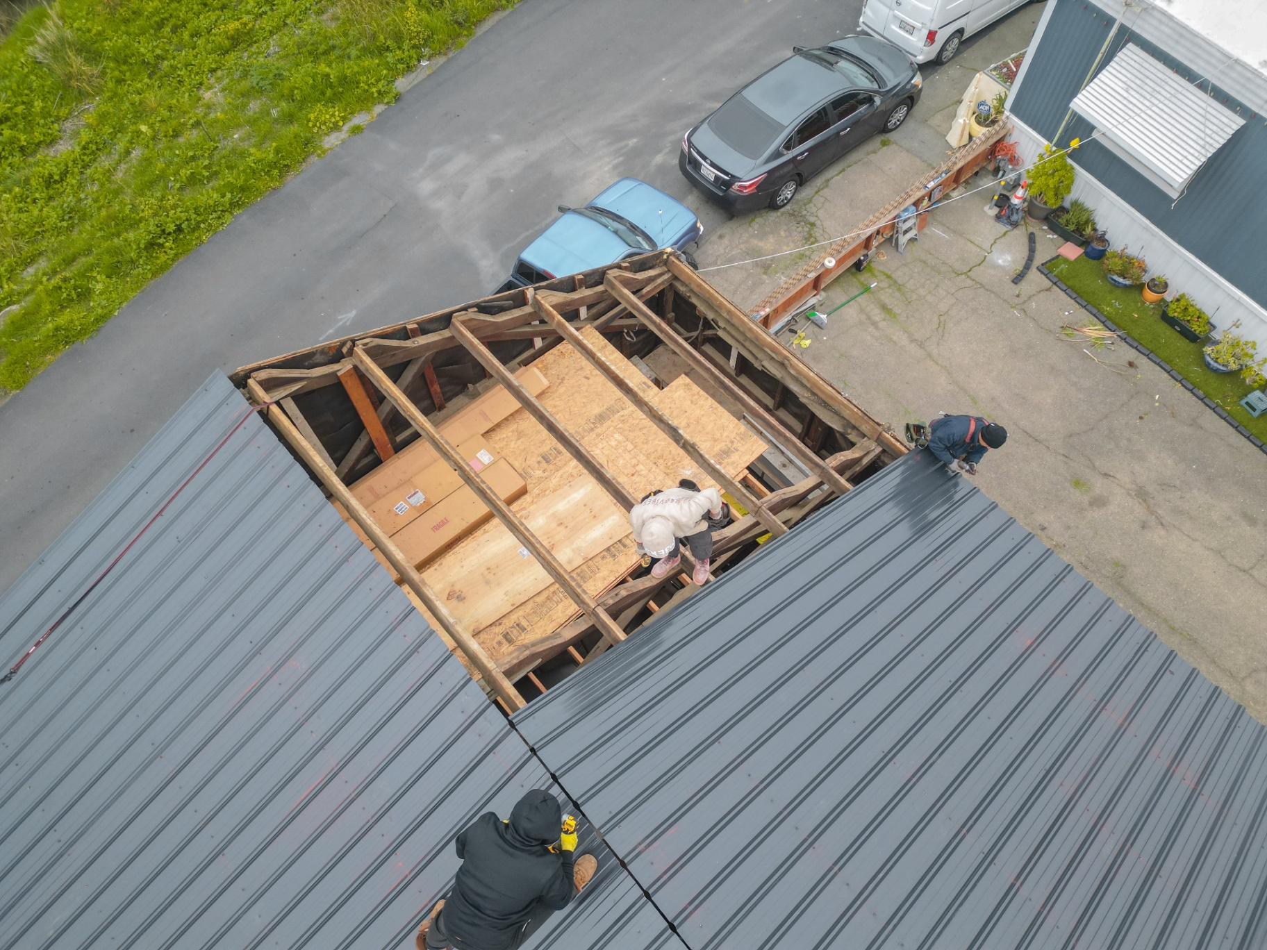 Top-down view of exposed roof framing during build