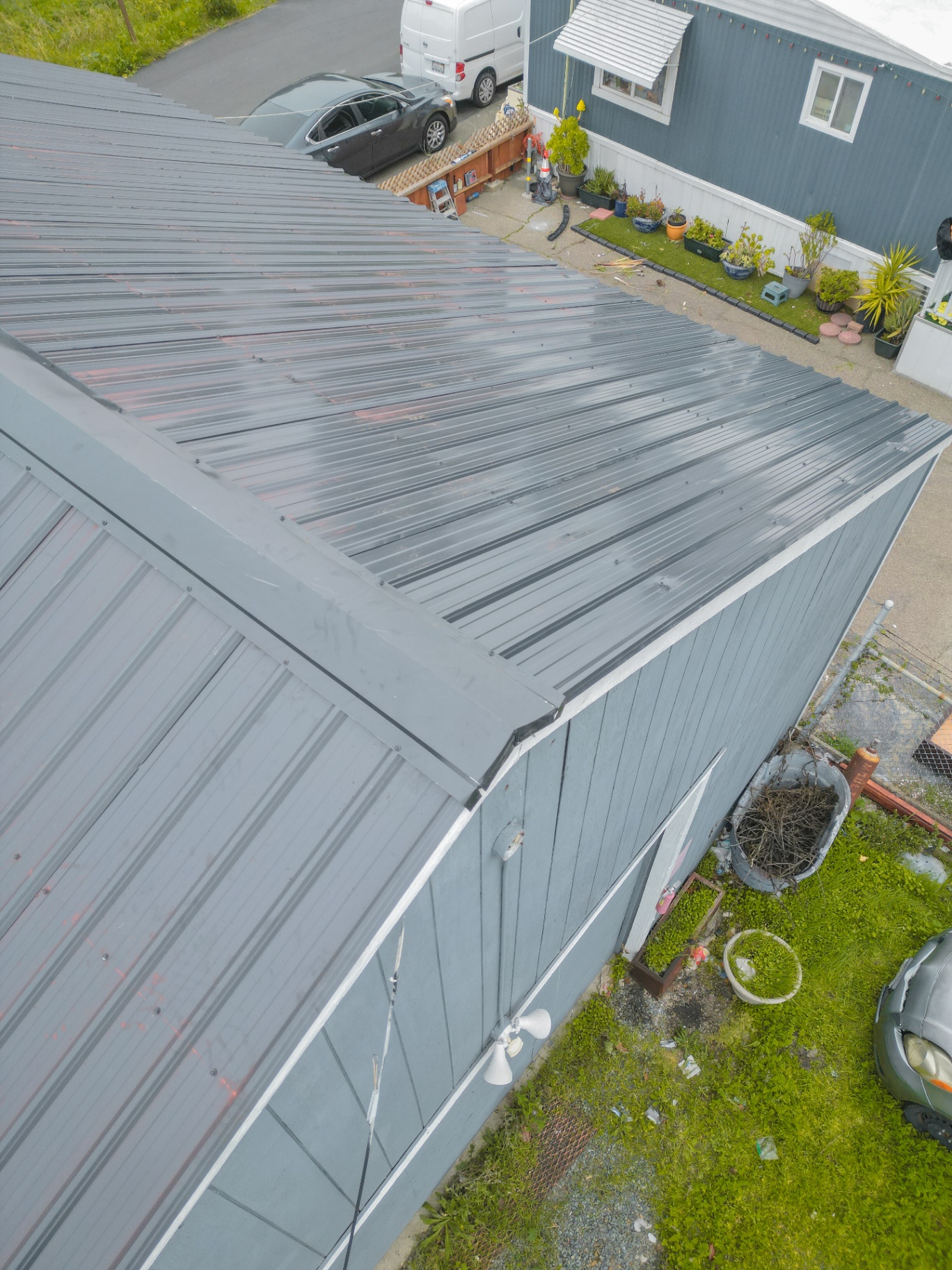 Top-down view of newly installed metal shed roof