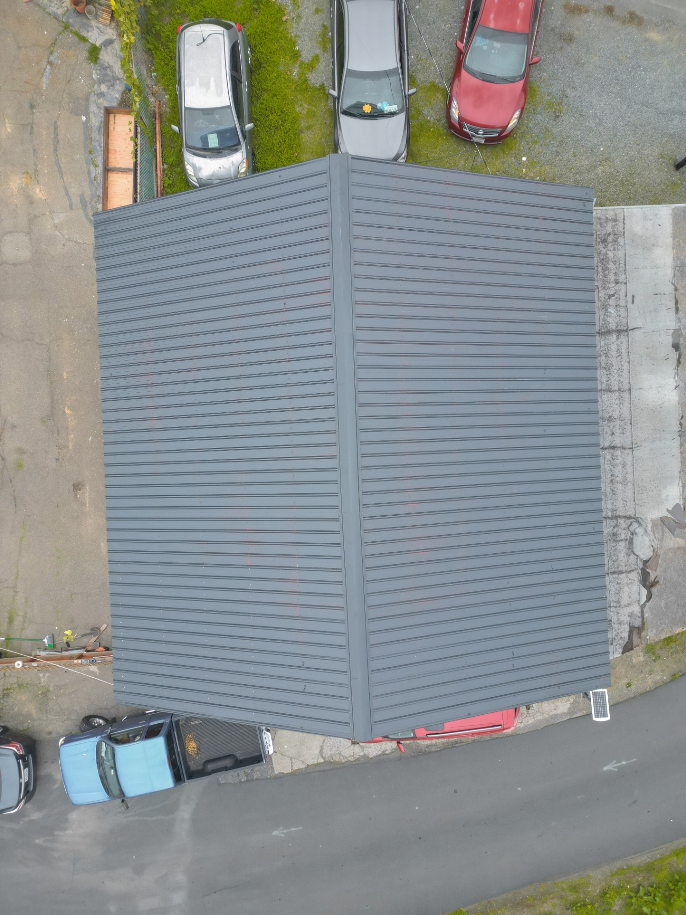 Top-down view of the completed standing seam metal roof