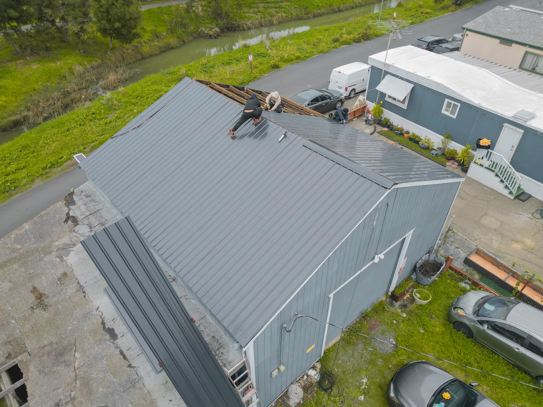 Standing seam metal roof nearing completion